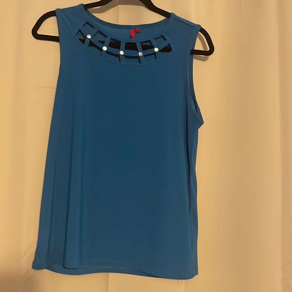 Cute turquoise top with interesting neckline